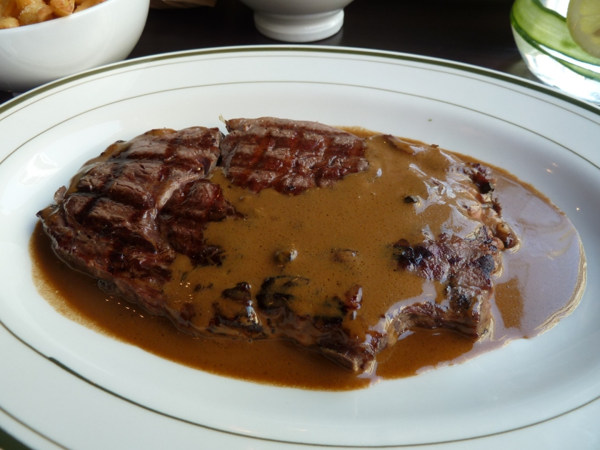 Don't judge by appearance: 300g of ribeye steak with green peppercorn sauce 