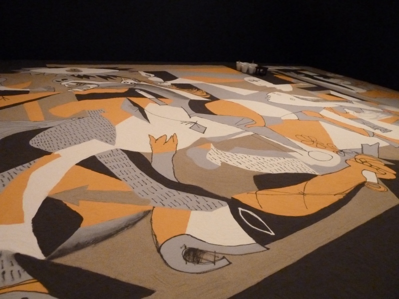 Guernica in sand